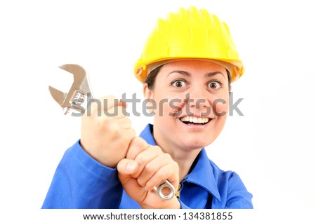 Female builder with helmet and big wrench - stock photo - stock-photo-female-builder-with-helmet-and-big-wrench-134381855