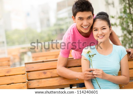 http://thumb7.shutterstock.com/display_pic_with_logo/1032538/114240601/stock-photo-portrait-of-a-lovely-couple-on-their-first-date-girl-holding-a-white-rose-114240601.jpg