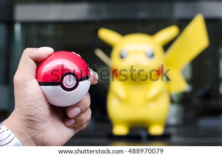 pikachu holding pokeball