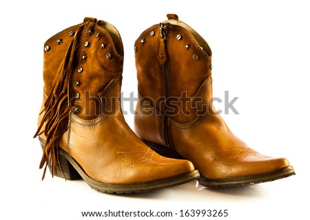 Cowboy shoes isolated on a white background - stock photo