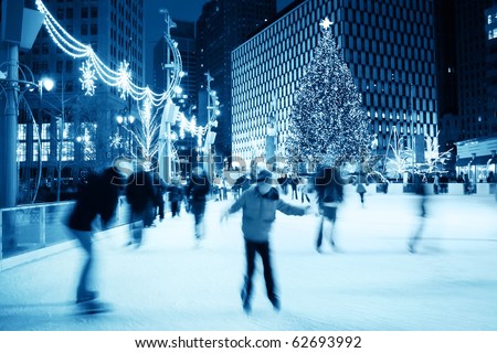 Ice Skating at Christmas (motion blur) - stock photo