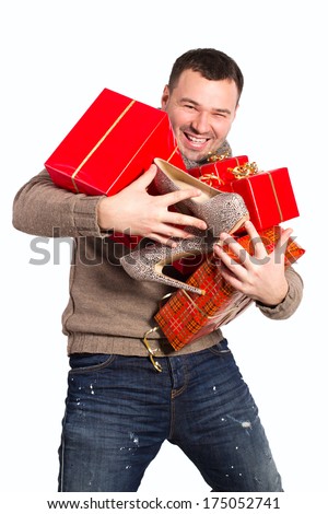 http://thumb7.shutterstock.com/display_pic_with_logo/1286701/175052741/stock-photo-emotional-man-holding-a-lot-of-gifts-in-his-hands-man-bought-a-lot-of-gifts-for-the-woman-he-loved-175052741.jpg