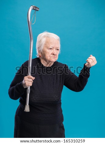 Angry Old Woman Stock Photos, Images, & Pictures 