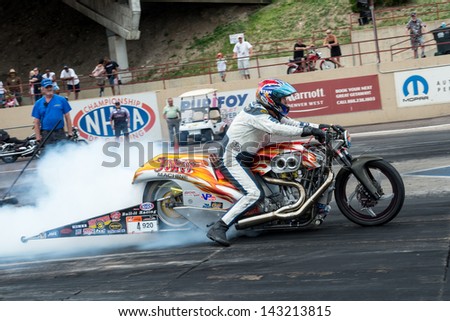 Michelin ou quoi ?? Stock-photo-morrison-co-june-bike-does-a-burnout-during-thunder-on-the-mountain-presented-by-grease-143213815