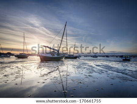 Boats in Poole Harbour at Sandbanks in Dorset - stock photo