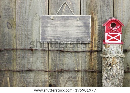 with over  red red  sign barbed sign rustic barn fence hanging wire  rustic post Blank
