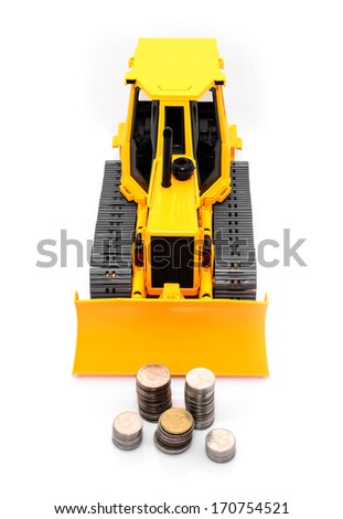  - stock-photo-yellow-toy-bulldozer-and-coins-isolated-over-white-background-170754521