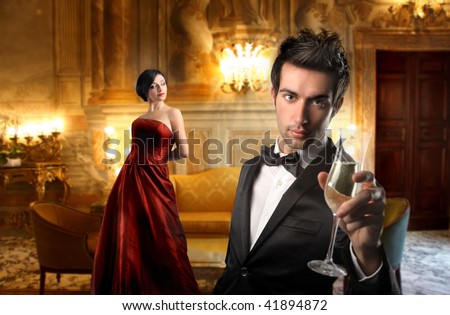 http://thumb7.shutterstock.com/display_pic_with_logo/160669/160669,1259446963,1/stock-photo-elegant-couple-drinking-wine-in-a-luxury-interior-41894872.jpg