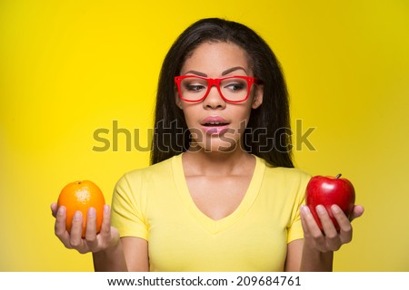 Yellow dress with red apples background. Yellow dress with red apples background.