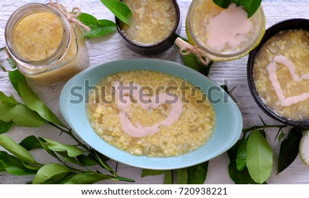 Vietnamese food for dessert, grapefruit sweet gruel, a popular sweet soup make from grape fruit slivered rind with green bean, coconut milk and sugar