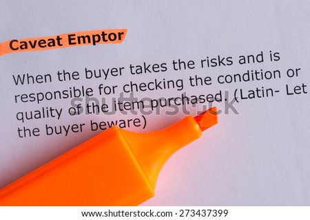 caveat word emptor highlighted paper shutterstock