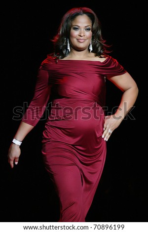 http://thumb7.shutterstock.com/display_pic_with_logo/203428/203428,1297322390,1/stock-photo-new-york-february-laila-ali-walks-the-runway-in-a-pea-in-the-pod-dress-at-the-heart-struth-70896199.jpg