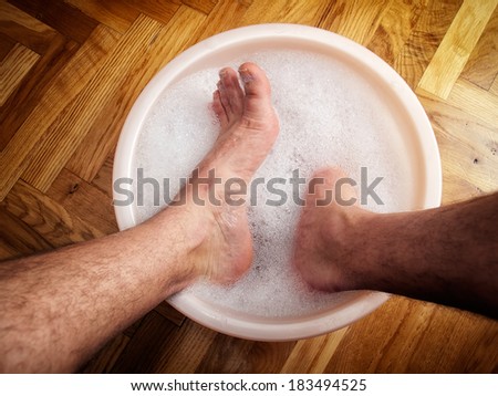 washing feet foot washbowl soaking man his shutterstock