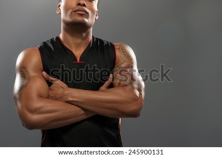 Proud of his fit body. Cropped image of young shirtless African man 