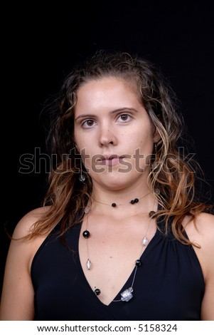 stock photo young woman posing in black background in casual clothes 5158324