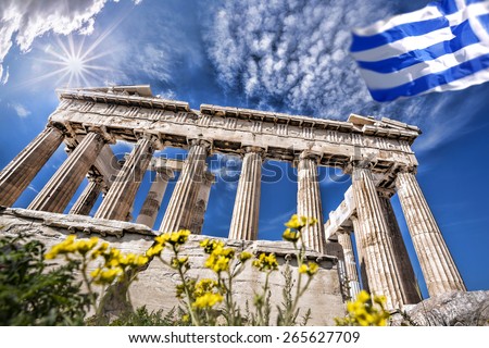 stock-photo-parthenon-temple-with-greek-flag-on-the-athenian-acropolis-greece-265627709.jpg