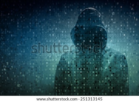  hacker over a screen with binary code - stock photo