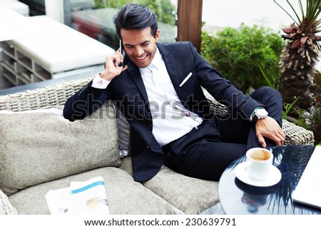 http://thumb7.shutterstock.com/display_pic_with_logo/2324765/230639791/stock-photo-businessman-answering-the-phone-with-a-smile-receiving-good-news-asian-businessman-having-a-phone-230639791.jpg