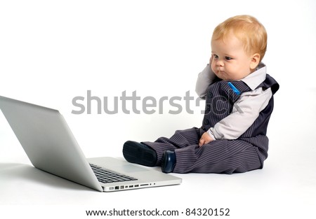 Is it true that Britain has become more racist? - Page 4 Stock-photo-baby-with-laptop-confused-84320152