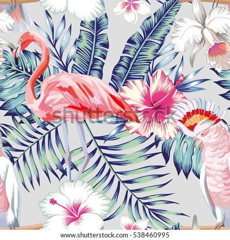 Tropical bird pink flamingo and parrot macaw banana palm leaves in trendy blue style and flowers hibiscus, frangipani, orchid. Seamless vector pattern Tropical bird pink flamingo and parrot macaw banana palm leaves in trendy blue style and flowers hibiscus, frangipani, orchid. Seamless vector pattern