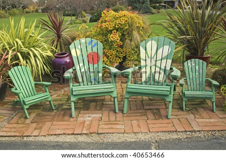 Large And Small Adirondack Chairs Stock Photos, Royalty-Free Images