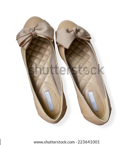 Light brown gloss summer and autumn flat shoes isolated on white