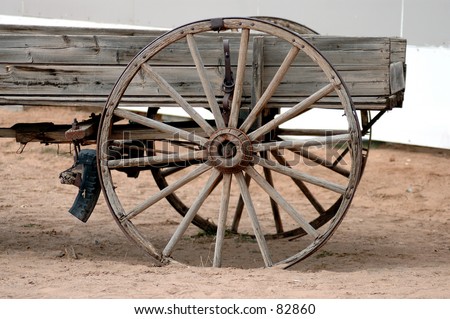 stock-photo-old-buckboard-wagon-and-whee