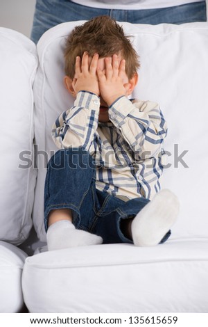 stock-photo-portrait-of-little-boy-closing-eyes-with-his-hands-at-home-135615659.jpg