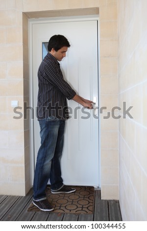 door man opening closing shutterstock