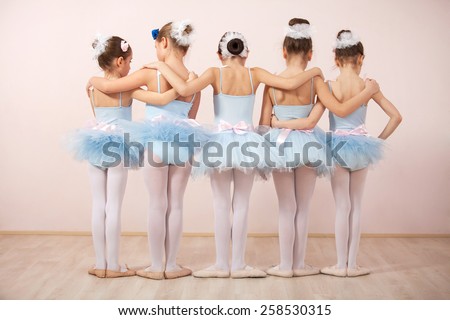 stock-photo-group-of-five-little-ballerinas-posing-together-with-back-to-camera-they-are-good-friend-and-258530315.jpg