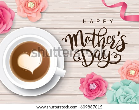 Flat lay style mother's day greeting card with coffee cup and flowers on wooden table. Flat lay style mother's day greeting card with coffee cup and flowers on wooden table.