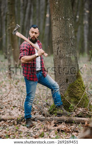 stock-photo-bearded-man-with-an-ax-269269451.jpg