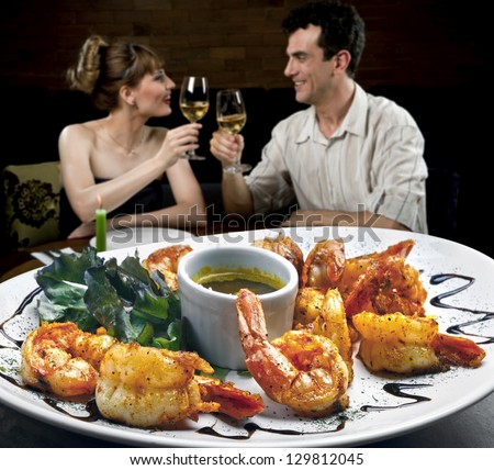 http://thumb7.shutterstock.com/display_pic_with_logo/304690/129812045/stock-photo-couple-in-restaurant-129812045.jpg