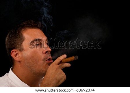 stock-photo-smoker-relaxing-and-enjoying-his-cuban-cigar-60692374.jpg