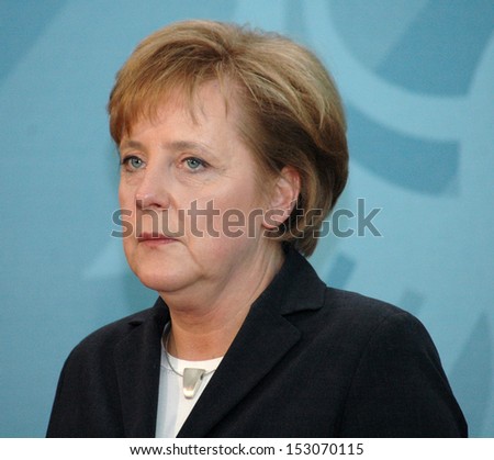  - stock-photo-december-berlin-chancellor-angela-merkel-at-a-press-conference-after-a-meeting-with-the-153070115