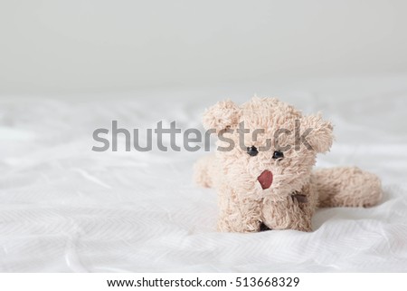 teddy bear lying down