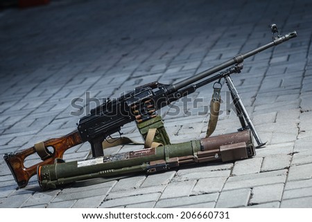 thumb7.shutterstock.com/display_pic_with_logo/340270/206660731/stock-photo-pkm-and-rpg-on-the-ground-206660731.jpg