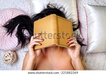 [Obrazek: stock-photo-girl-with-a-book-on-her-face...882269.jpg]