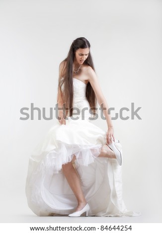 Taking off wedding dress