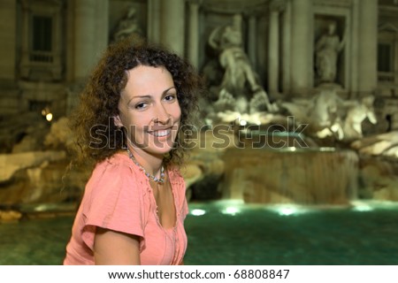 http://thumb7.shutterstock.com/display_pic_with_logo/4225/4225,1294524127,129/stock-photo-young-beautiful-woman-near-fountain-fontana-di-trevi-at-night-in-rome-italy-68808847.jpg