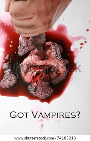 stock-photo--got-vampires-a-man-drives-a-wooden-stake-through-a-vampire-heart-in-order-to-kill-the-undead-74185213.jpg