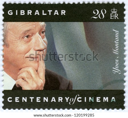 - stock-photo-gibraltar-circa-a-stamp-printed-in-gibraltar-shows-yves-montand-circa-120199285