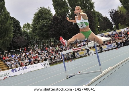  - stock-photo-turin-june-giulia-latini-from-italy-runs-m-hurdles-women-at-xix-turin-international-track-142748041