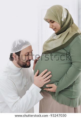 http://thumb7.shutterstock.com/display_pic_with_logo/516343/516343,1327095468,1/stock-photo-pregnant-muslim-wife-smiling-with-her-husband-kissing-belly-and-his-hands-on-belly-93247030.jpg