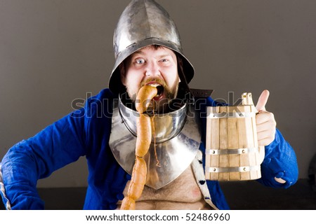 stock-photo-warrior-with-beer-and-sausag