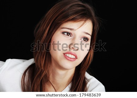  - stock-photo-teenage-girl-depression-lost-love-isolated-on-black-background-179483639