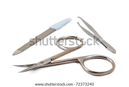 nail clippers, tweezers, nail file on a white background stock image