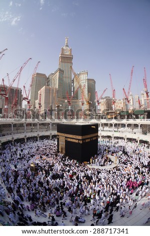 MECCA, SAUDI ARABIA-CIRCA MAY 2015: Muslims are doing tawaf around the Kaaba in Masjidil Haram on MAY, 2015 in Makkah, Saudi Arabia. Muslims all around the world come here doing umrah and hajj - stock photo