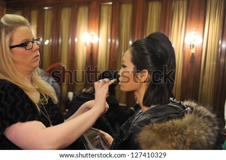http://thumb7.shutterstock.com/display_pic_with_logo/55912/127410329/stock-photo-new-york-february-models-gets-ready-backstage-for-russian-fashion-industry-reception-f-w-127410329.jpg