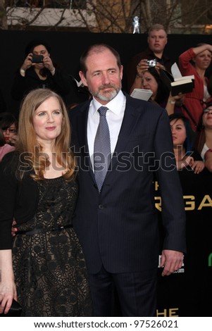  - stock-photo-los-angeles-mar-suzanne-collins-arrives-at-the-hunger-games-premiere-at-the-nokia-theater-97526021